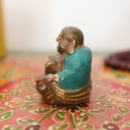 Left Side view of a Bronze Laughing Buddha Statue