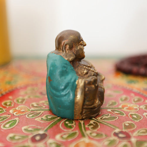 Right Side view of a Bronze Laughing Buddha Statue