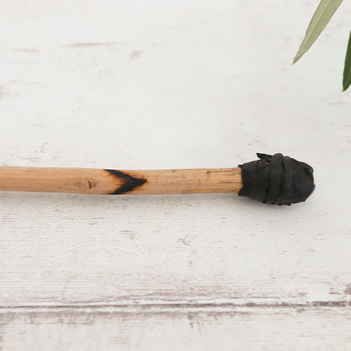 Close-Up of Wooden Beater with Rubber End