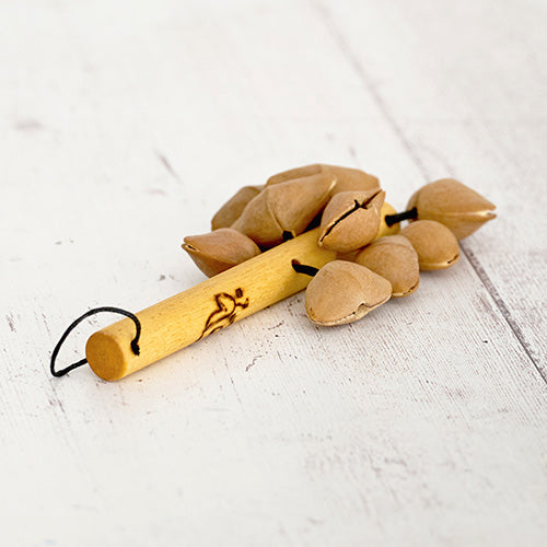 Lima kenari seed stick shaker with hanging hoop