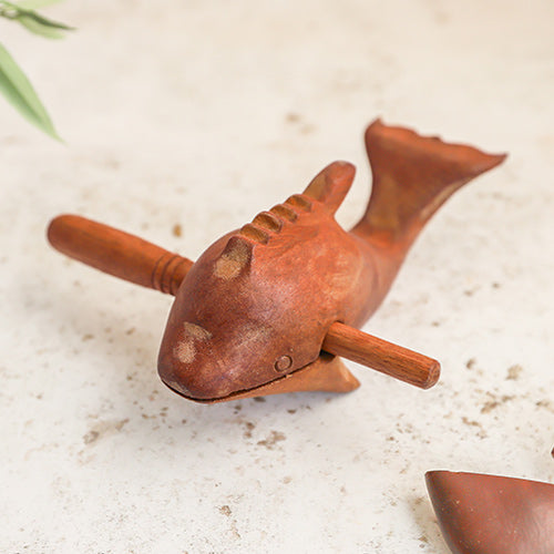 Front View of a Wooden Dolphin Whistle