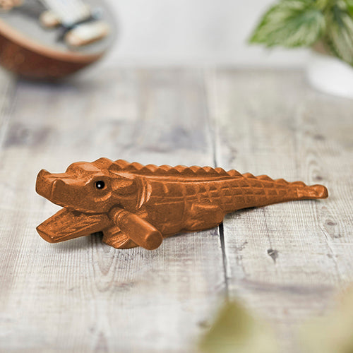 Wooden Crocodile Guiro with beater attached.