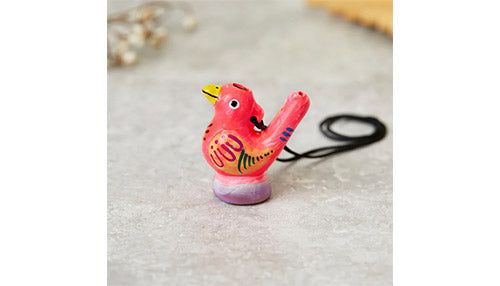 Ceramic painted pink bird water whistle, with black strap.