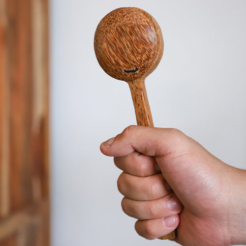 burfi castanet in hand