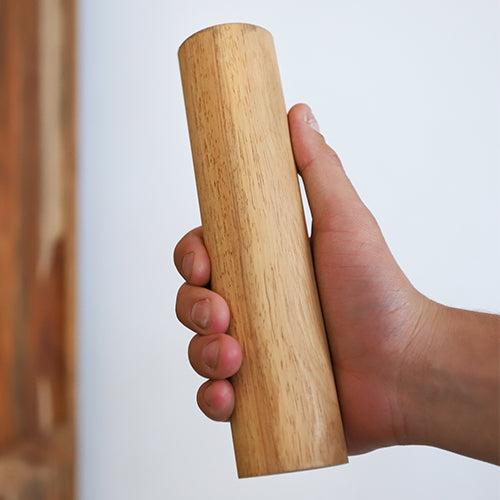 chord rubber wood shaker in hand