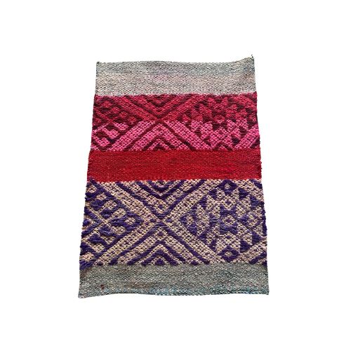 Square Peruvian wool rug with purple, reddish-pink, and grey vibrant colors.