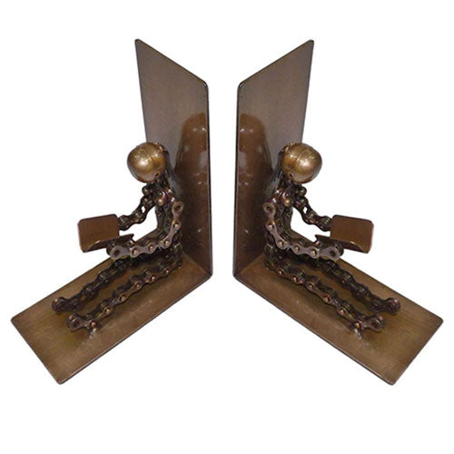 Sitting people bookends made from recycled bike parts in India