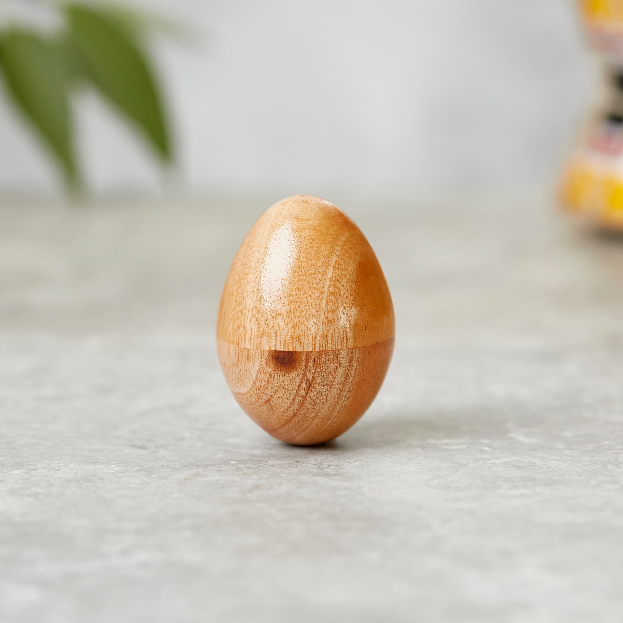 Solid wood egg shaker instrument