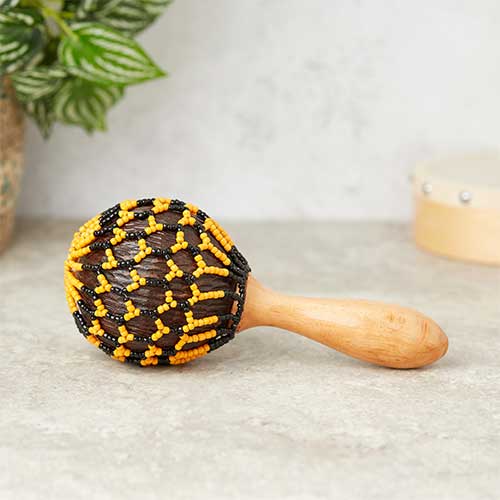 orange and black gourd shaker